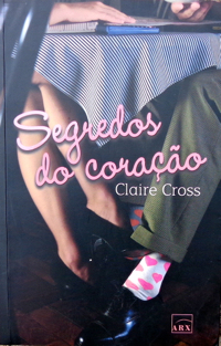 Double Trouble, second in the Coxwell series of contemporary romances by Deborah Cooke (writing as Claire Cross), Brazilian edition