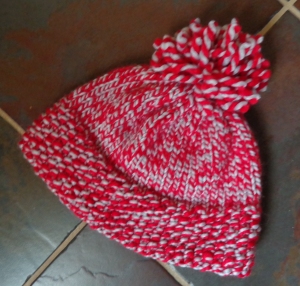 Hat in bulky marl knit by Deborah Cooke