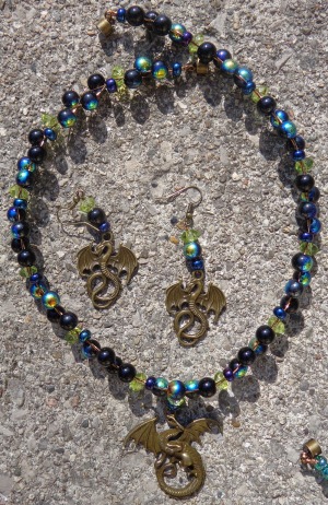 Dragon pendant and earrings with blue glass made by Deborah Cooke