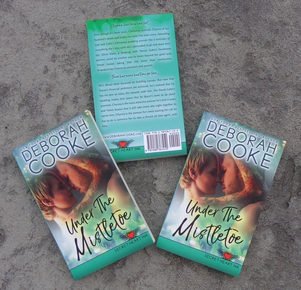 Under the Mistletoe, book four of the Secret Heart Ink series of contemporary romances by Deborah Cooke