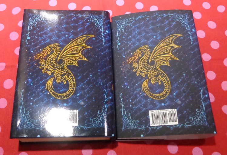 The gloss vs matte dust jacket for the Dragon Diaries retail omnibus by Deborah Cooke