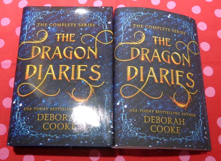 The gloss vs matte dust jacket for the Dragon Diaries retail omnibus by Deborah Cooke