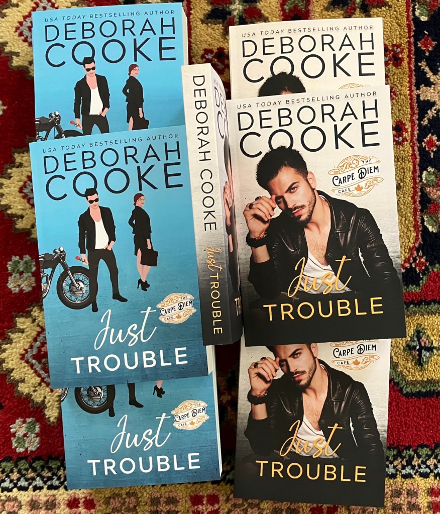 Just Trouble, book one of The Carpe Diem Café series of small town contemporary romances by Deborha Cooke in trade paperback