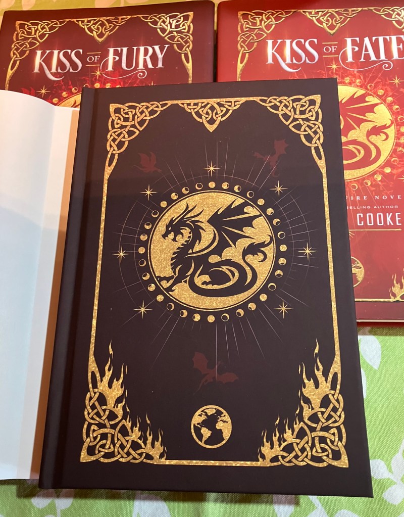 Jacketed hardcover of Kiss of Fire, showing the case laminate